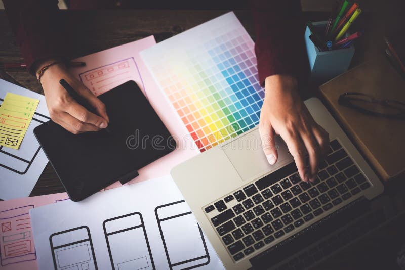 Web designers concept. Man brainstorming for ideas and sketching royalty free stock photo