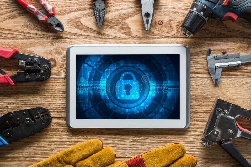 Web security and technology concept with tablet pc on wooden table stock image