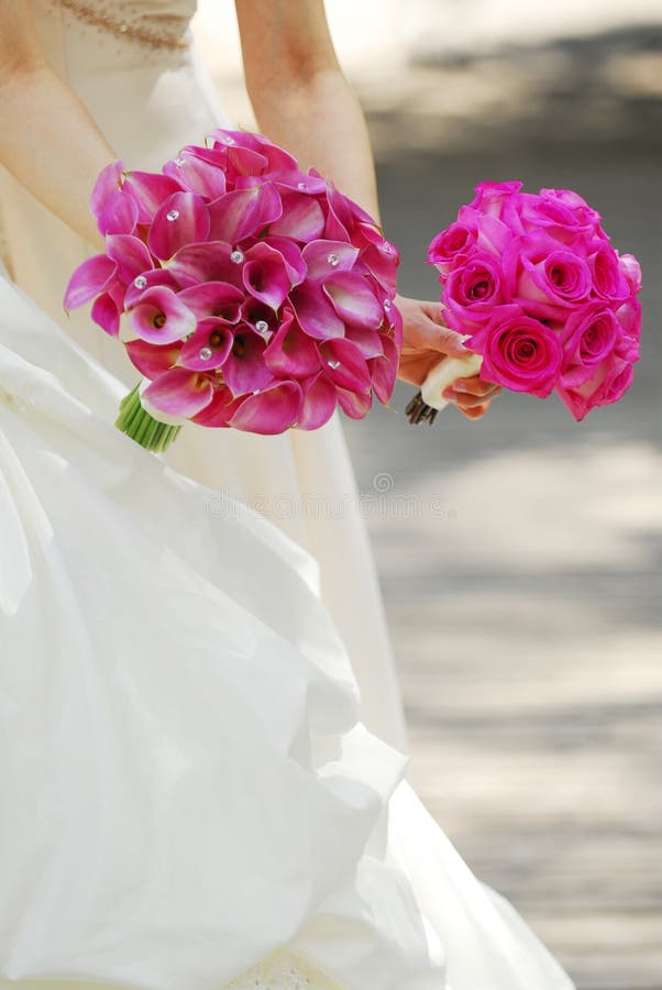 Bride - closeup on wedding bouquet.