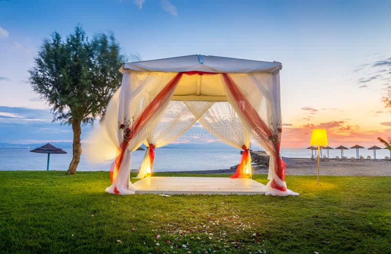 Wedding altar on greek shore at sunrise