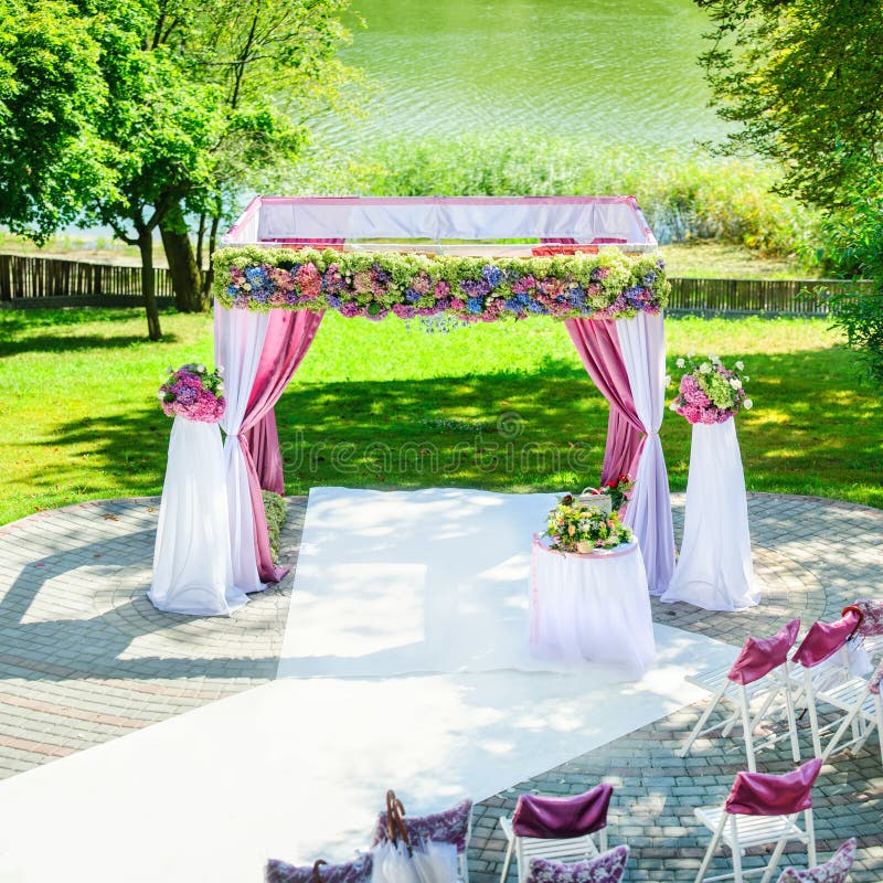 Wedding arch near the lake royalty free stock photos