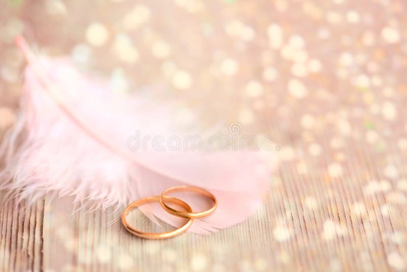 wedding background gold rings pink feather magical li golden lights 59267179