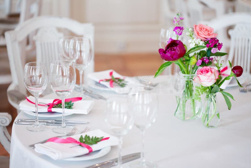 Wedding banquet, small restaurant floral, decor in red, informal style. stock photo Wedding banquet, small restaurant floral, decor in red, informal style. stock photo