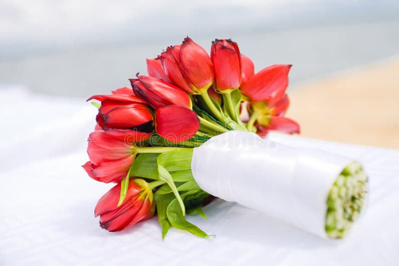 Wedding bouquet of the bride in table