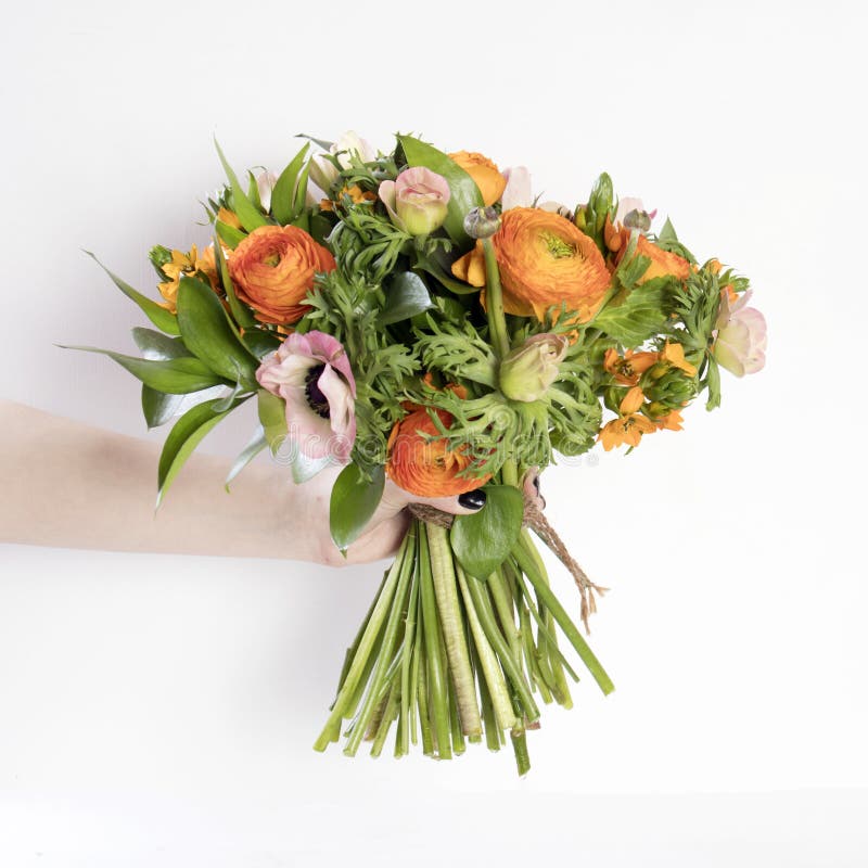 Wedding Bouquet of Buttercups, Anemones and Ruscus Stock Image - Image of  flora, event: 110330079