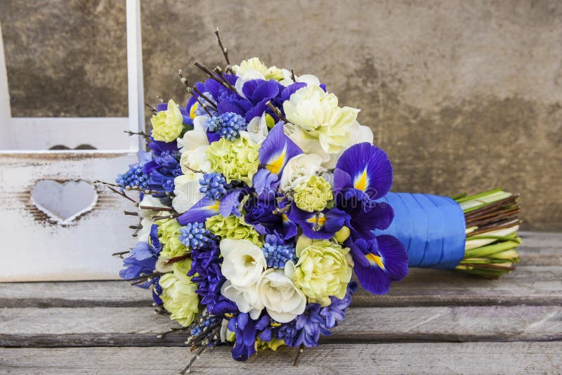 Wedding bouquet with carnations, irises, and muscari flowers royalty free stock photography Wedding bouquet with carnations, irises, and muscari flowers royalty free stock photography