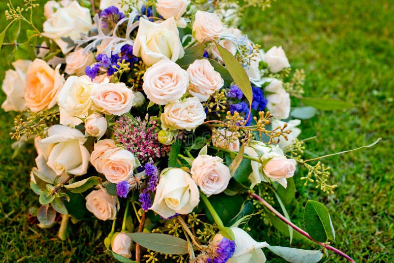 Wedding Bouquet on a Green Grass in the Park. Stock Image - Image of ...