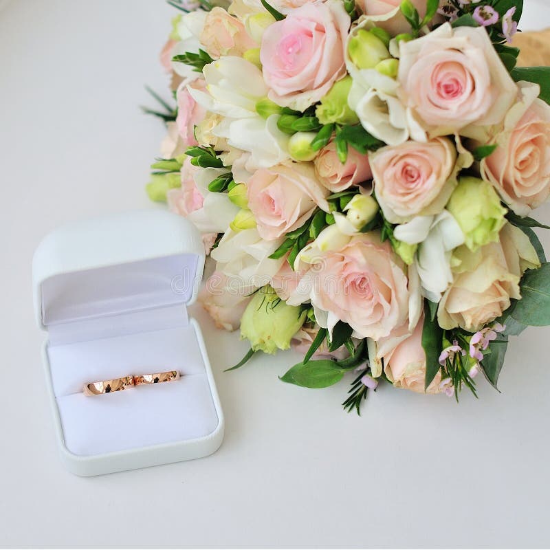 Wedding Bouquet about Wedding Rings Stock Photo Image of husband