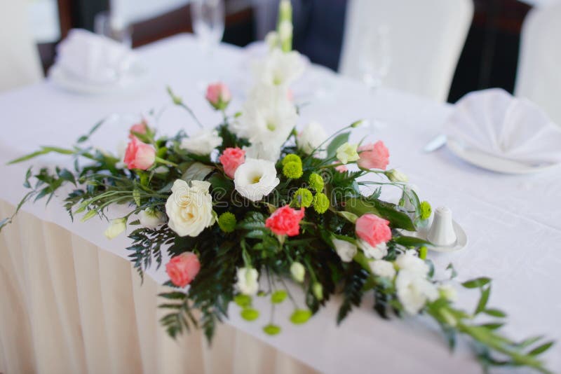 Wedding bouquet on a table stock photo. Image of light 20670176