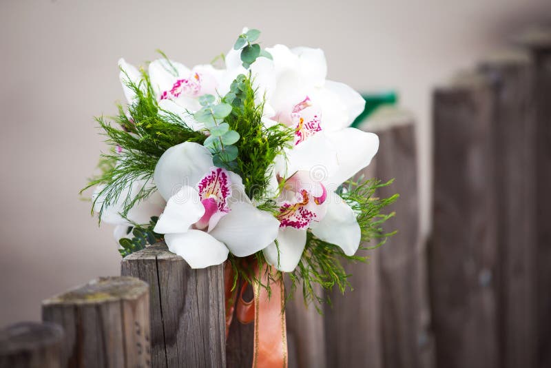 Wedding bouquet with white orchids