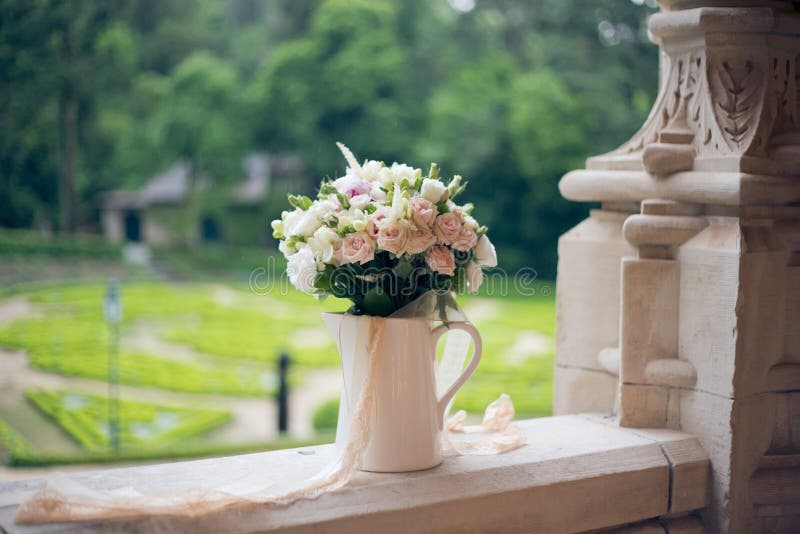 Wedding bouquet on the window of the old castle stock photos Wedding bouquet on the window of the old castle stock photos