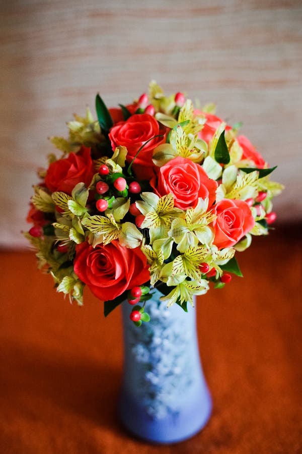 Wedding Bridal Bouquet of Yellow and Red in a Vase Stock Photo Image