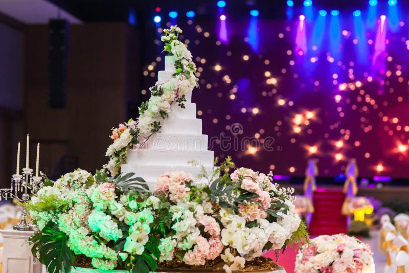 Wedding Cake on Flower Near Wedding Candle. Stock Photo Image of bouquet, honeymoon 139020568