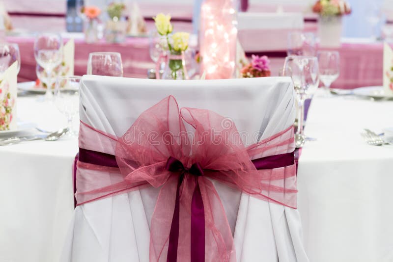 Wedding chairs with ribbon stock image. Image of glass 60244723