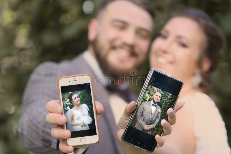Wedding couple bride with mobiles phone close up photo royalty free stock photos Wedding couple bride with mobiles phone close up photo royalty free stock photos