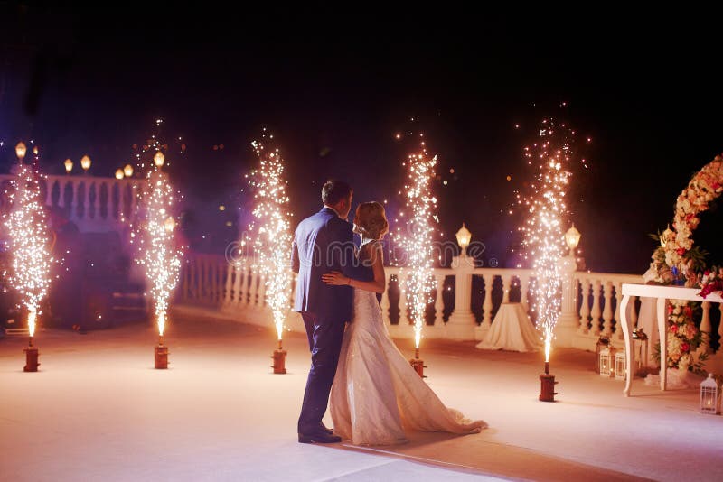 Wedding Couple Dancing in Sparklers Their First Dance Stock Image
