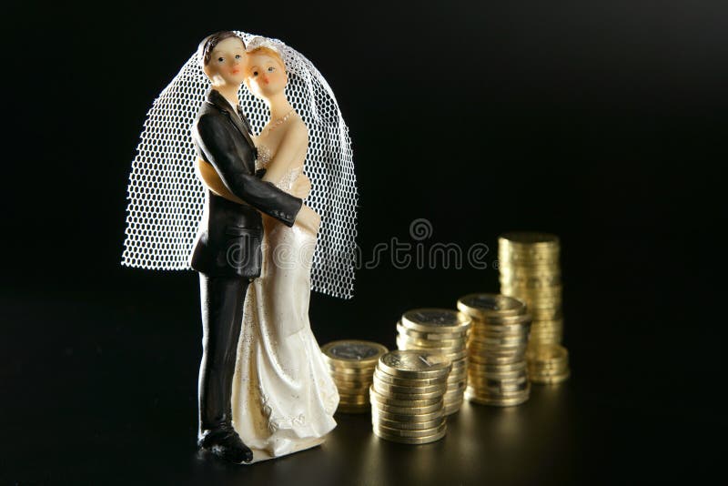 Wedding couple figurine and golden coins