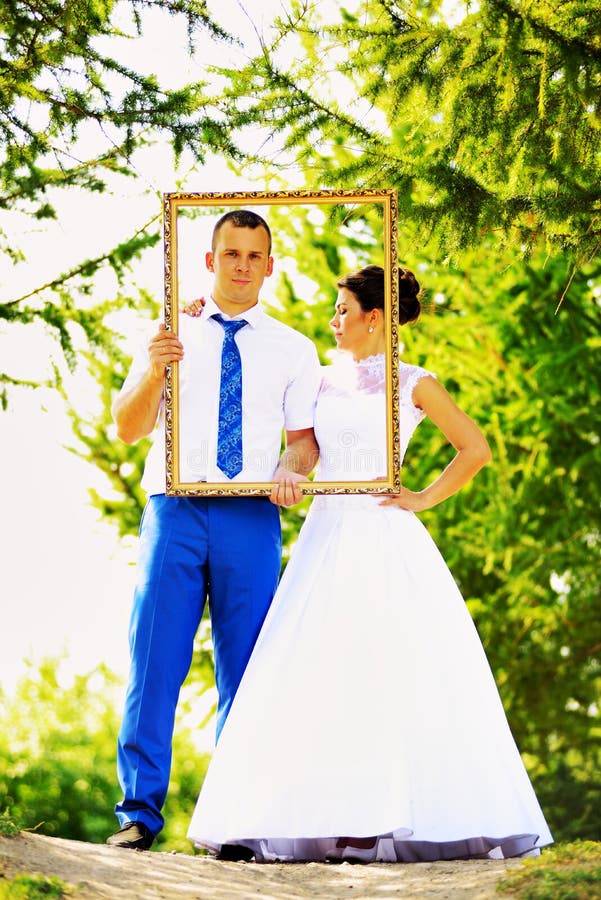Wedding couple in the frame royalty free stock photos Wedding couple in the frame royalty free stock photos