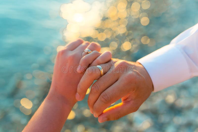 5 849 Couple Holding Hands Sea Sunset Photos Free Royalty Free Stock Photos From Dreamstime