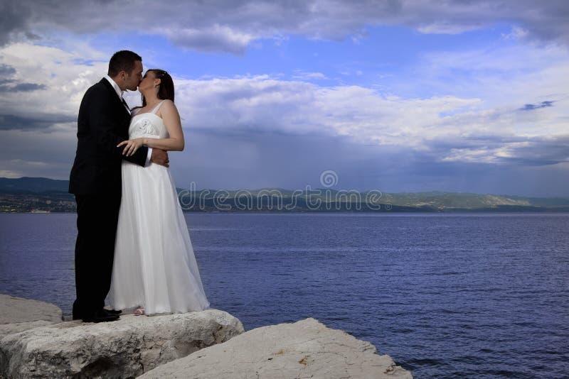 Wedding couple by the sea