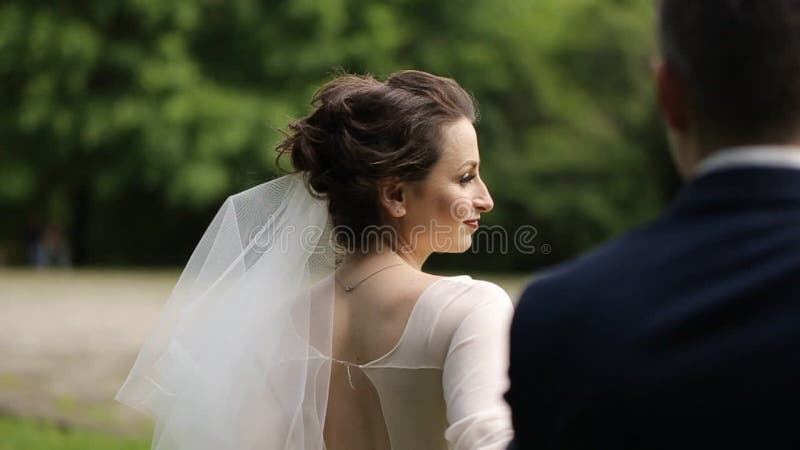 Wedding Day. Bride and Groom Holding Hands