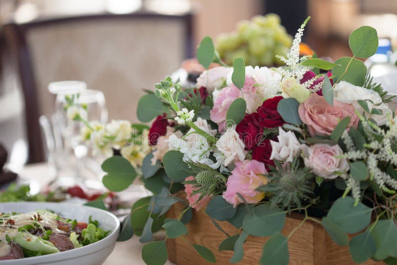Wedding Decor. Flowers in the Restaurant, Food on the Table Stock Image