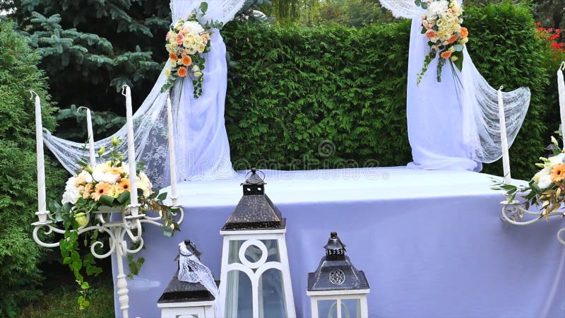 Wedding decoration with table and white arch