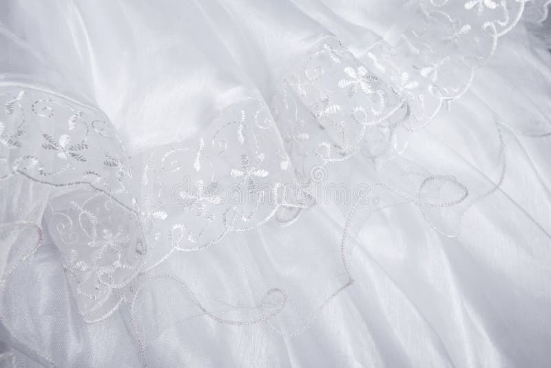 White wedding veil decorated with lace. White wedding veil decorated with lace