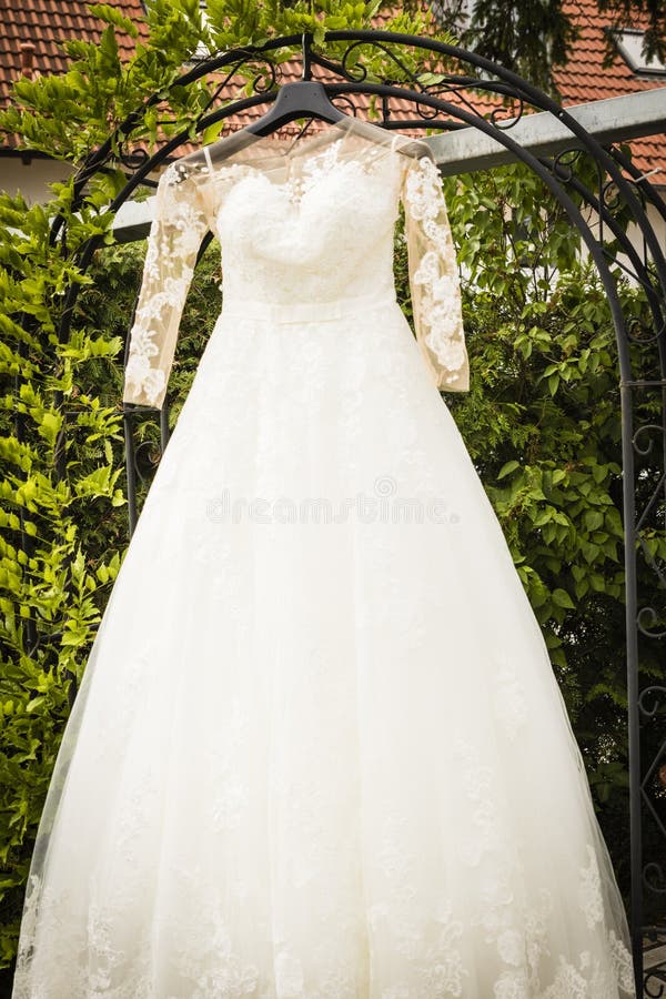 A Wedding Dress on Wedding Day Stock Photo Image of hanger, bridal