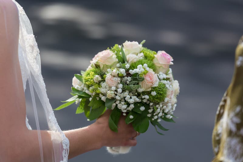 Wedding Flowers in Brides Hand Stock Photo Image of symbol, green