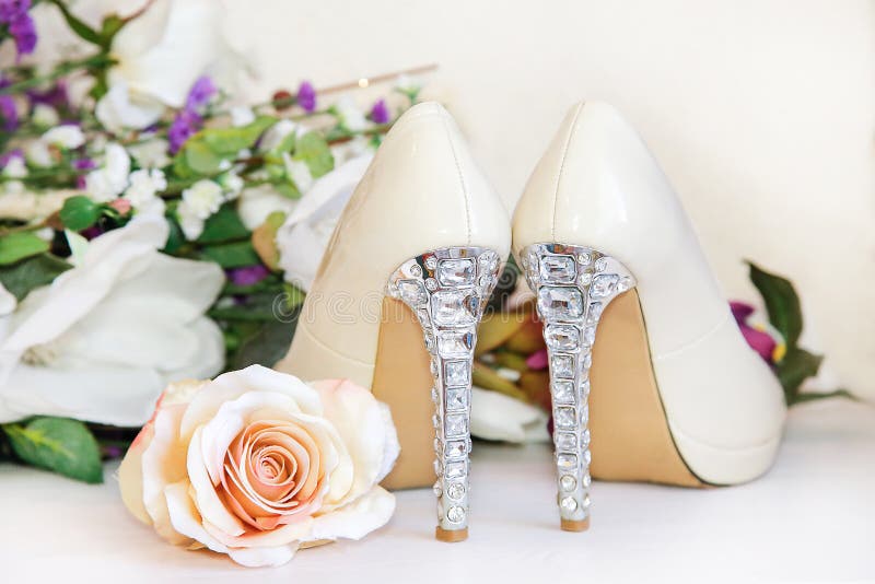The heels of wedding shoes are decorated with precious stones royalty free stock image The heels of wedding shoes are decorated with precious stones royalty free stock image