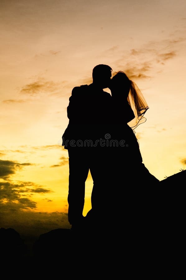 Wedding kiss as husband and wife
