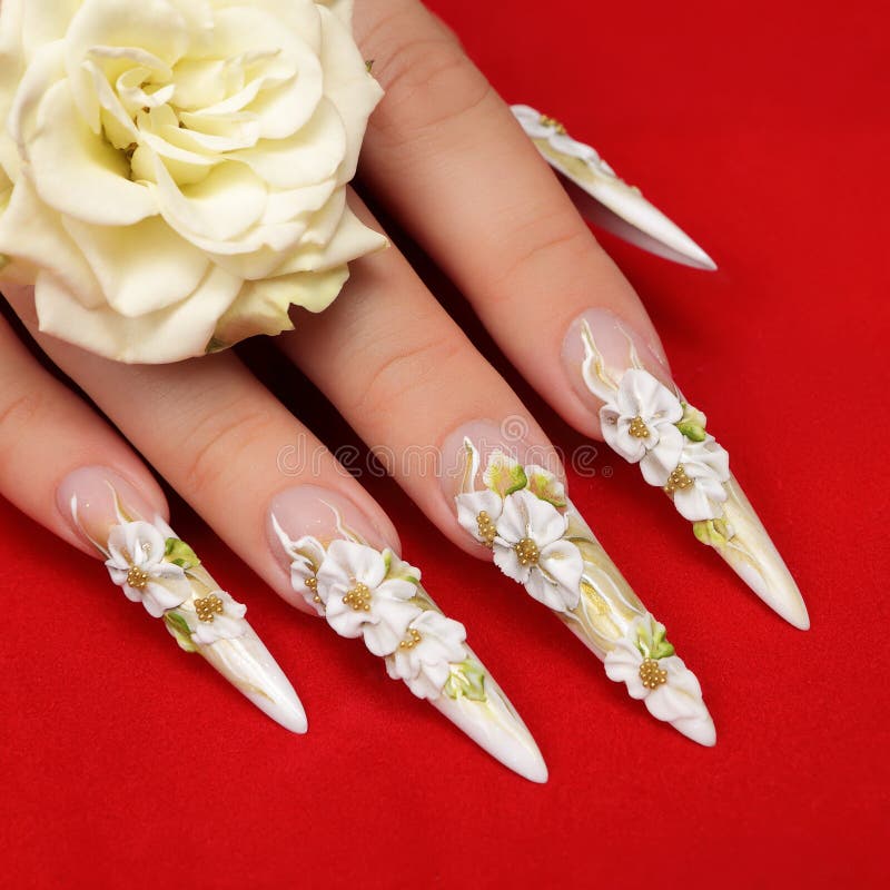 Shot Beautiful Manicure with Flowers on Female Fingers. Nails Design. Closeup Stock Image