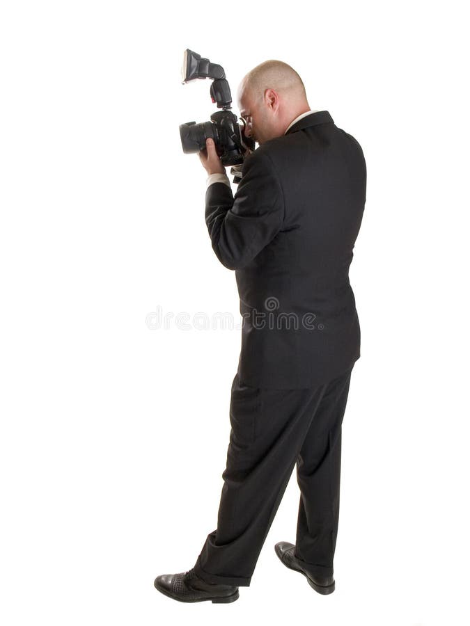 Wedding photographer. Stock photo of a well dressed wedding photographer. Full length, isolated on white royalty free stock photography Wedding photographer. Stock photo of a well dressed wedding photographer. Full length, isolated on white royalty free stock photography