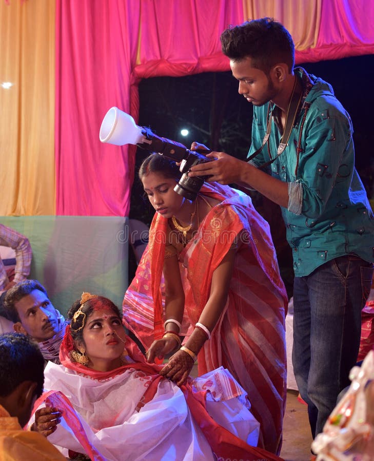 Wedding Photographer in Action, Taking a Picture of the Indian Bride and Groom Editorial Image - Image of love, photographing: 216207955 Wedding Photographer in Action, Taking a Picture of the Indian Bride and Groom Editorial Image - Image of love, photographing: 216207955