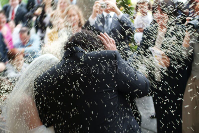 Wedding, traditional throwing of rice over married. Wedding, traditional throwing of rice over married