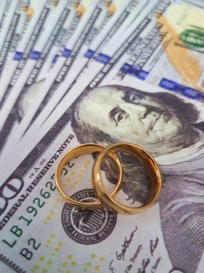 Wedding ring of gold in banknotes