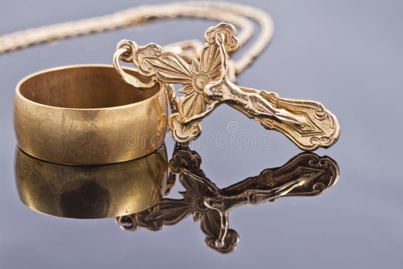 Wedding Ring and Gold Orthodox Cross Stock Image Image of union