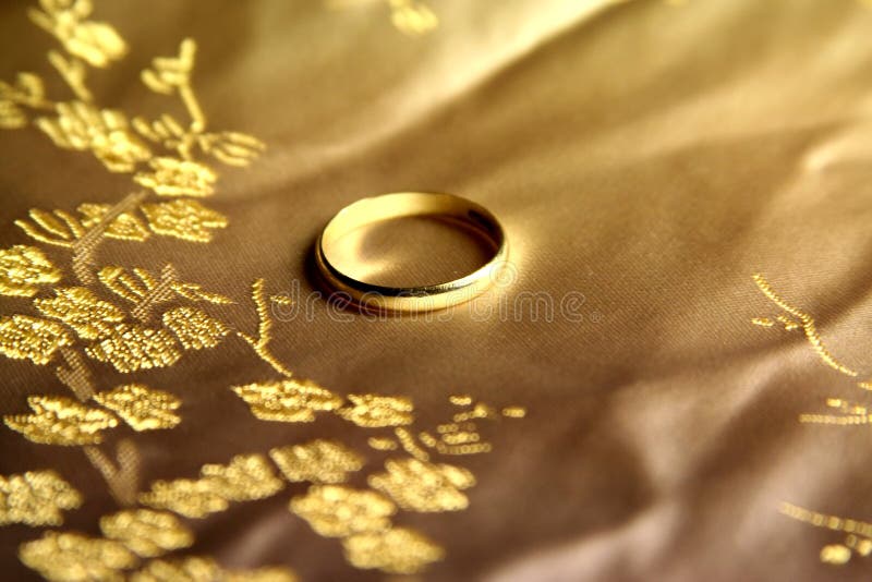 Wedding ring on silk