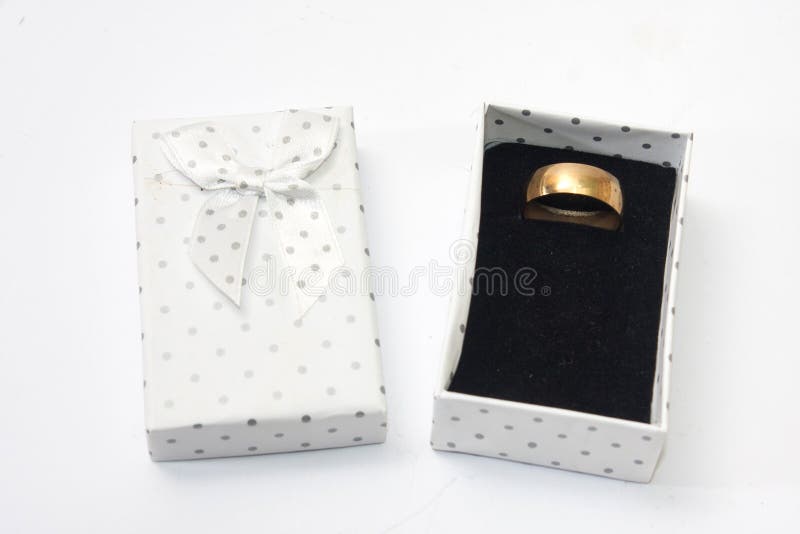 Wedding Ring in the Box with Padlock and Message Board Stock Image
