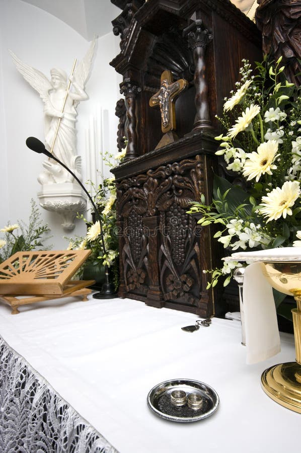 Wedding rings on altar