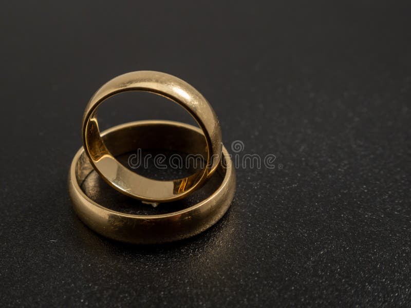 Wedding Rings on a Black Background. Gold Rings Stock Photo Image of