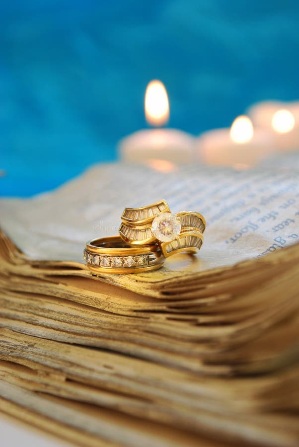 Wedding Rings on a Book stock image. Image of still, ring 19842257