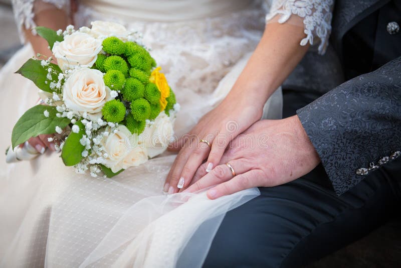 Wedding, rings and bouquet stock photo. Image of plant 84221466