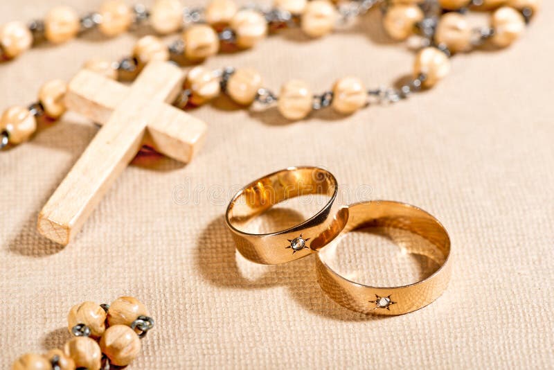 Wedding Rings and Cross stock photo. Image of holy, hope - 38513200