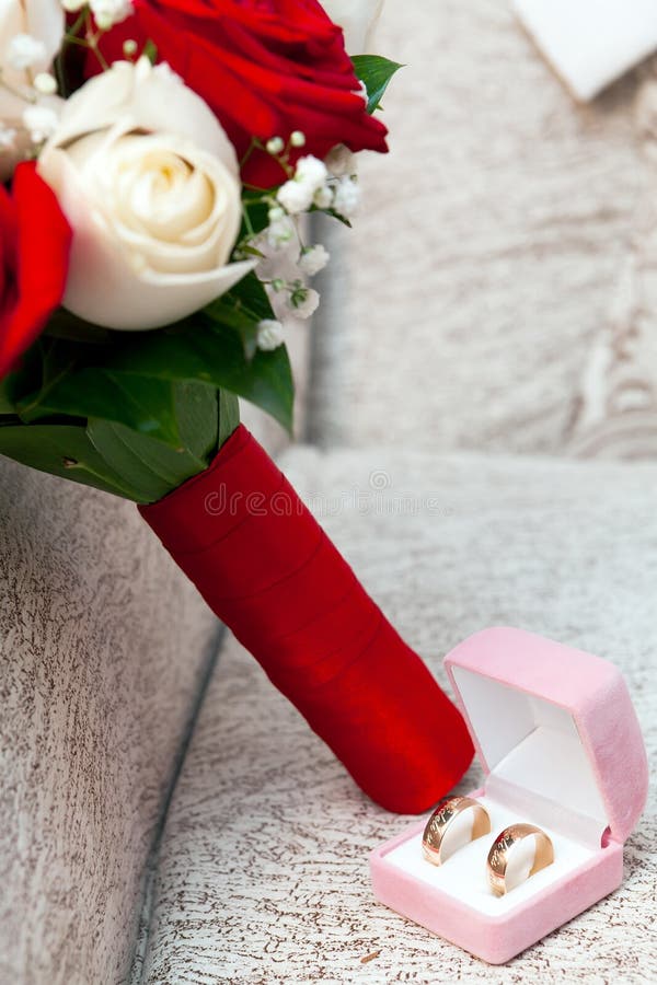 Wedding Rings, Gift Box and Flowers Stock Photo Image of petals