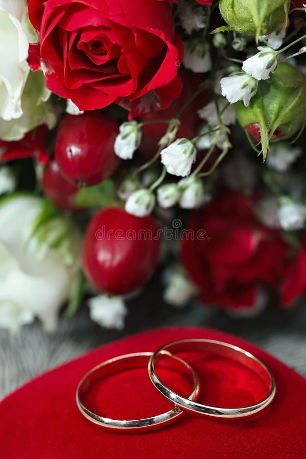 Wedding Rings, Gift Box and Flowers for Bride. Stock Photo Image of couple, gold 61136716