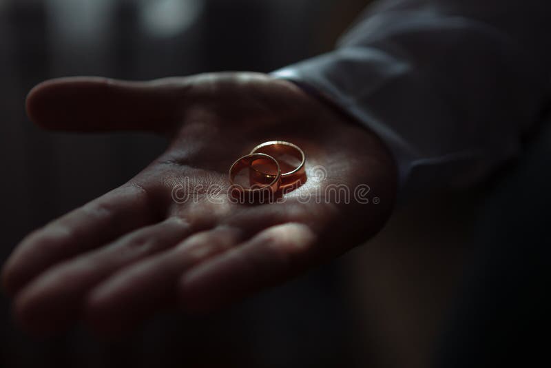 Wedding rings in a hand stock image. Image of pink, luxury 247456921