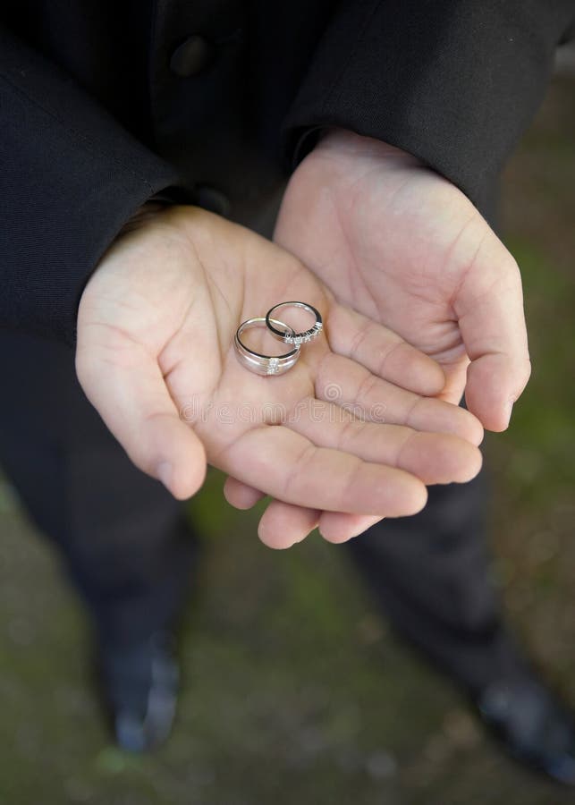 Wedding Rings in Hand stock photo. Image of gold, groom 7344624