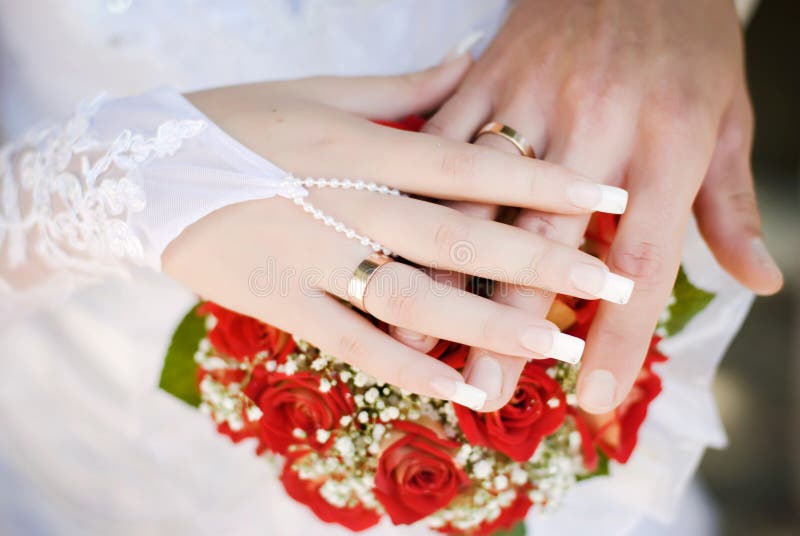 Wedding rings on hands